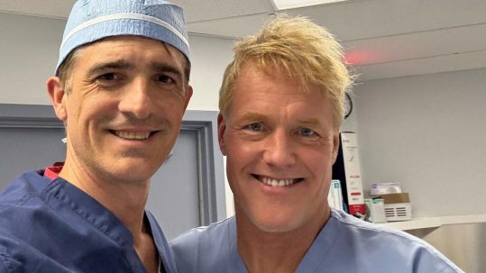 Dr. Roman working with friend and colleague Dr. Kevin Pauza in Florida